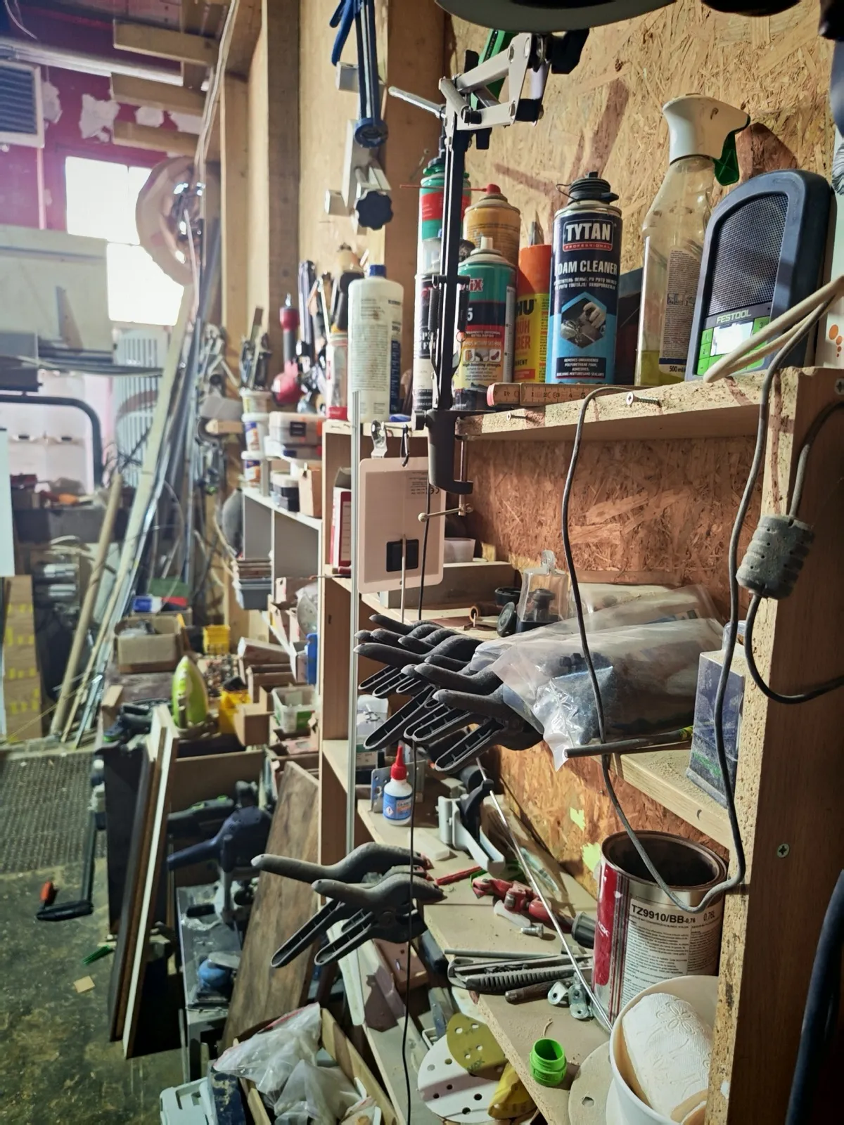 Components laid out on the workshop floor for a custom piece